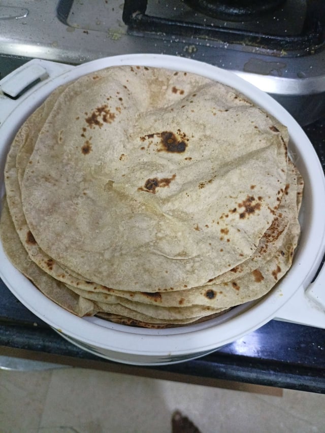 Delicious Tawa Rotis prepared by COOX