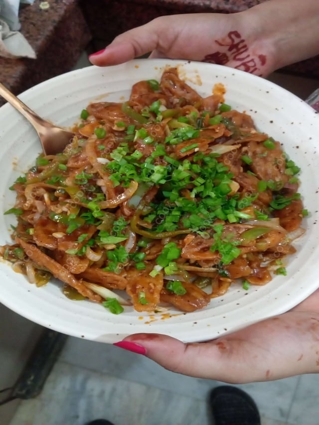 Delicious Chilli Lotus Stem prepared by COOX
