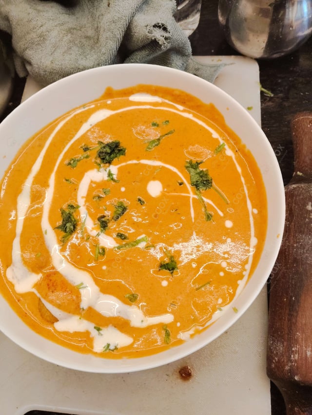Delicious Malai Kofta (Orange Gravy) prepared by COOX