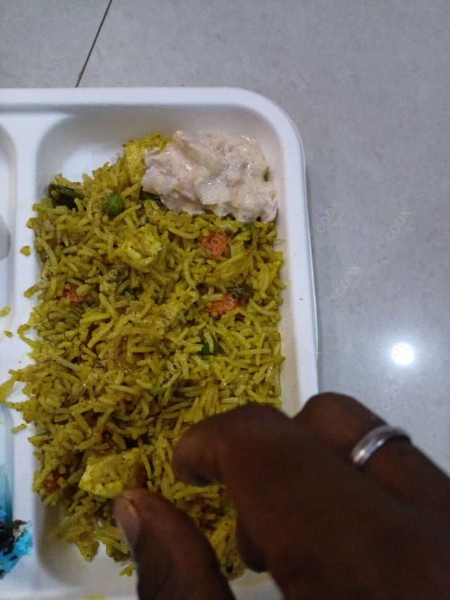 Delicious Veg Biryani prepared by COOX