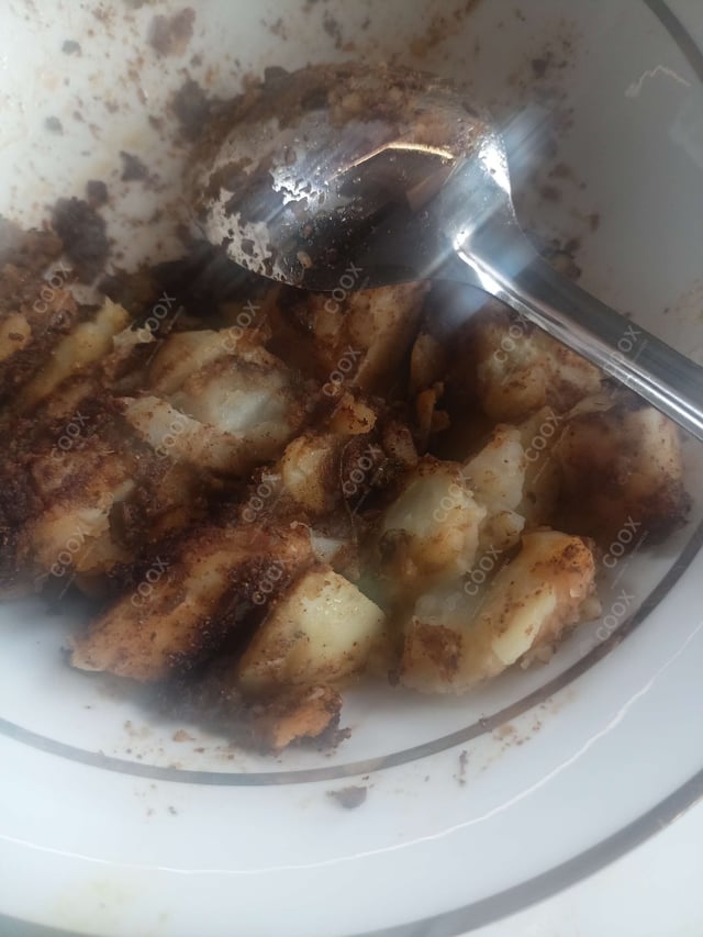 Delicious Dum Aloo prepared by COOX