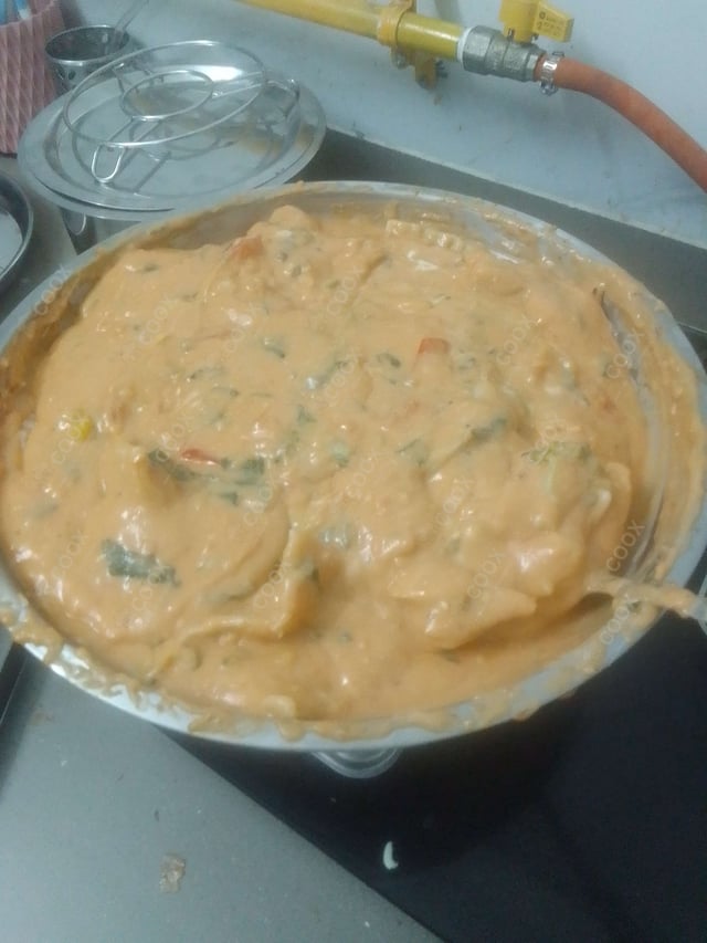 Delicious Ravioli in Pink Sauce prepared by COOX
