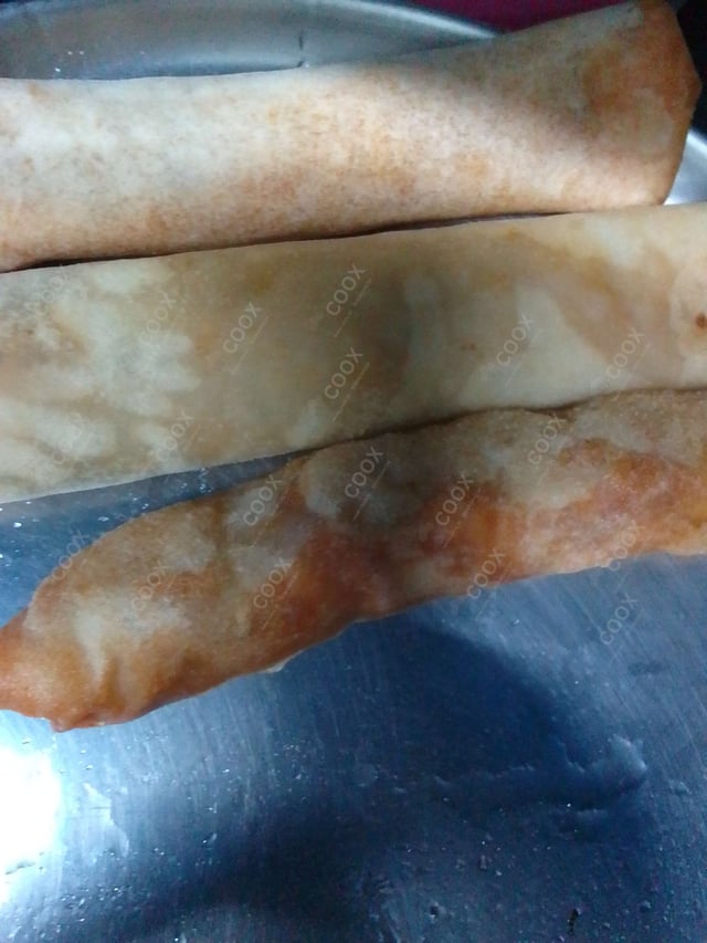 Delicious Veg Spring Rolls prepared by COOX