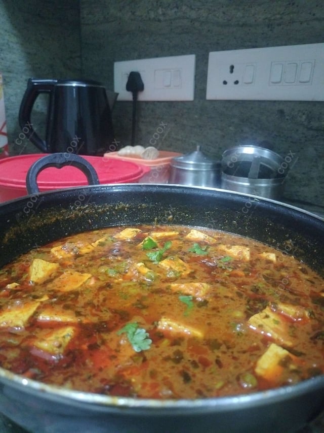 Delicious Matar Paneer prepared by COOX