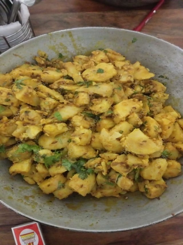 Delicious Jeera Aloo prepared by COOX