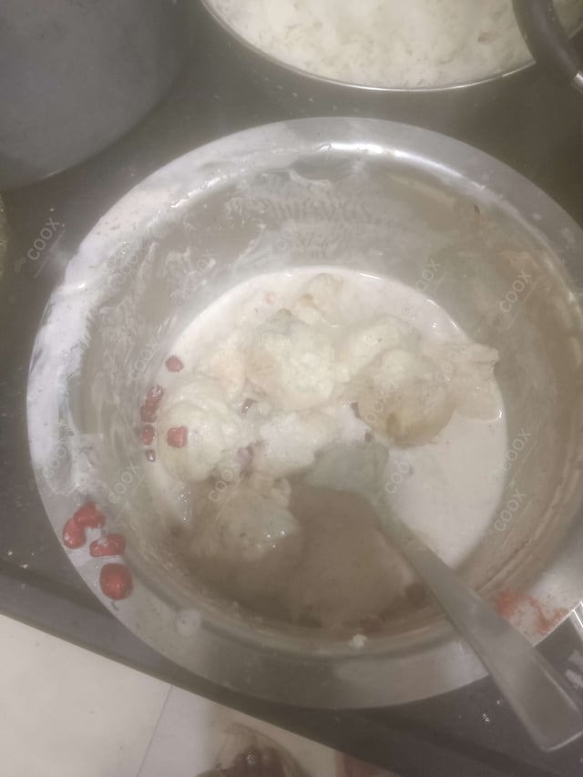 Delicious Dahi Bhalla prepared by COOX