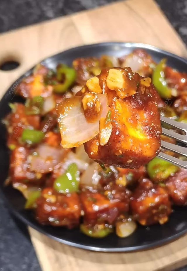 Delicious Chilli Paneer (Dry) prepared by COOX
