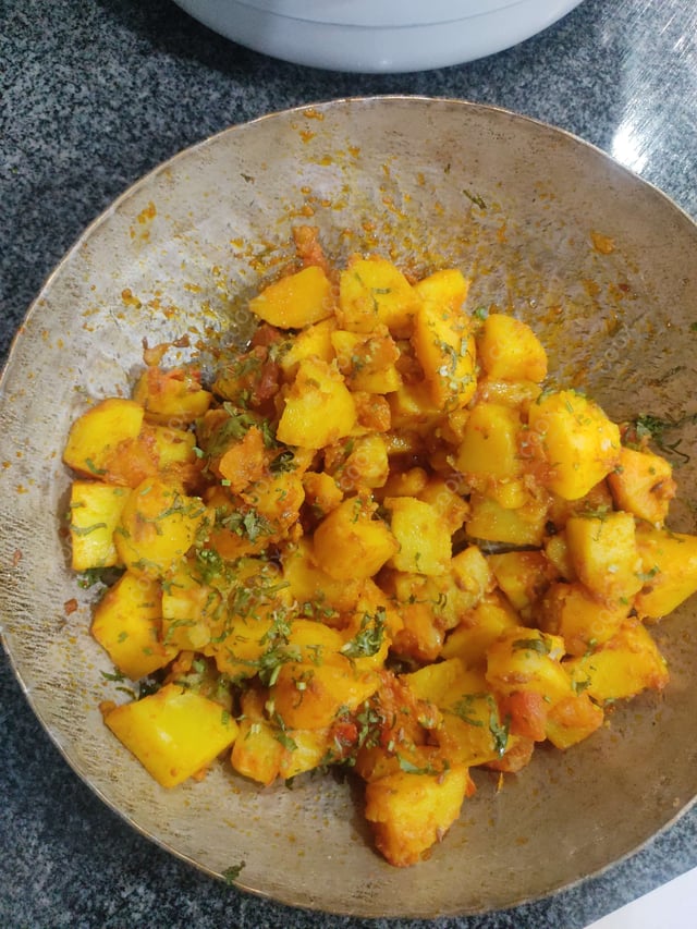 Delicious Jeera Aloo prepared by COOX