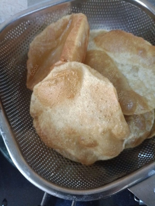 Delicious Pooris & Bedmis prepared by COOX