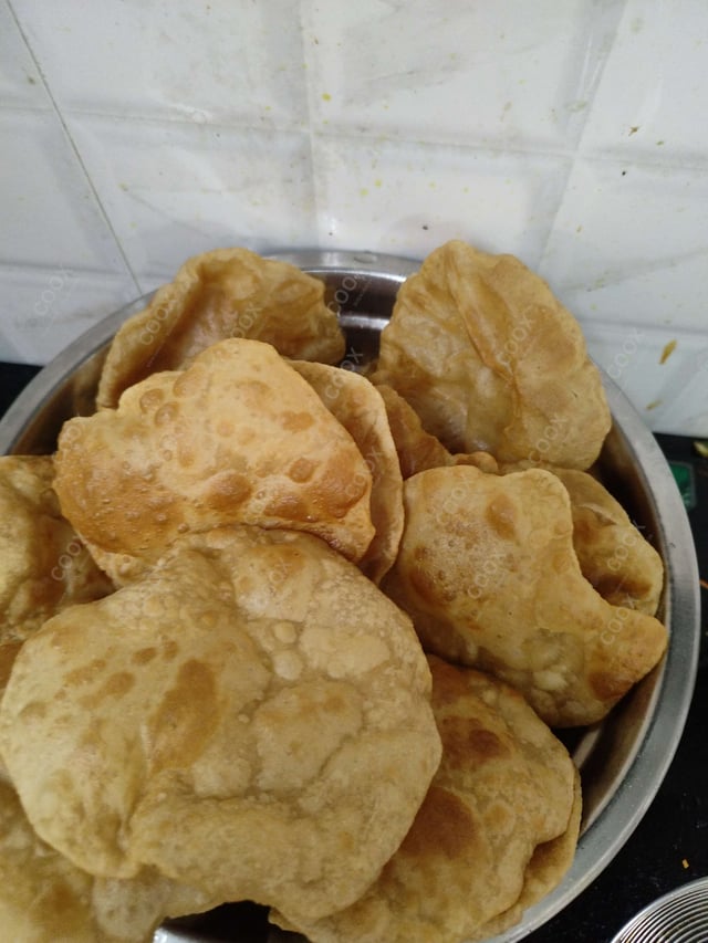 Delicious Pooris & Bedmis prepared by COOX