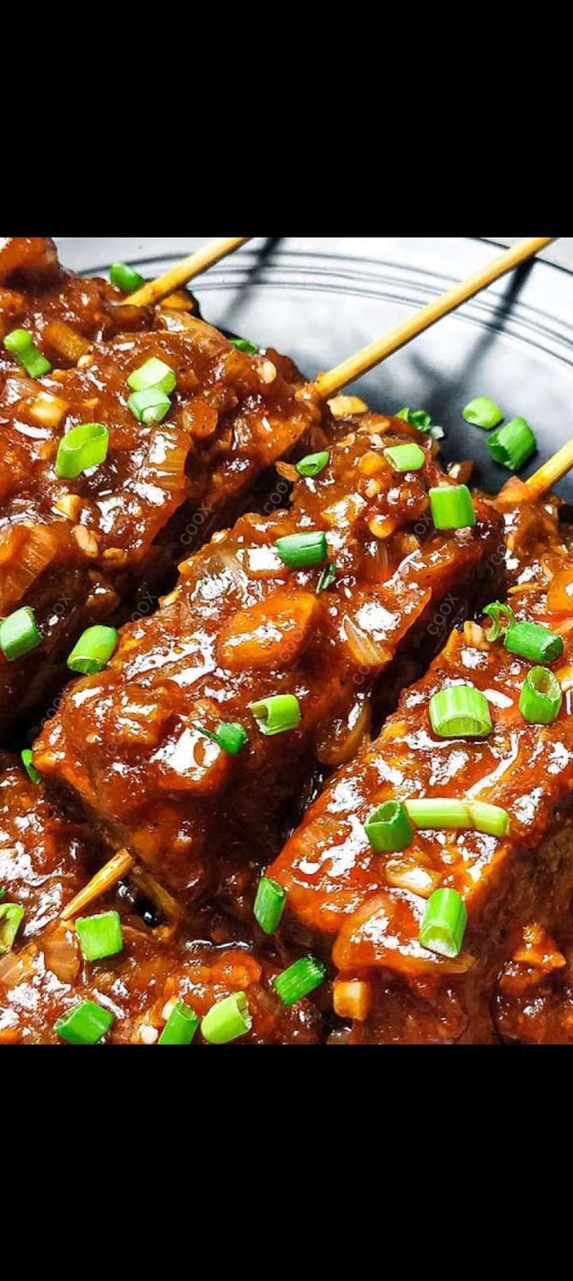 Delicious Thai Paneer Satay prepared by COOX