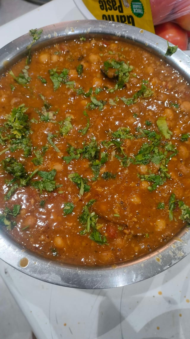 Delicious Chana Bhatura prepared by COOX