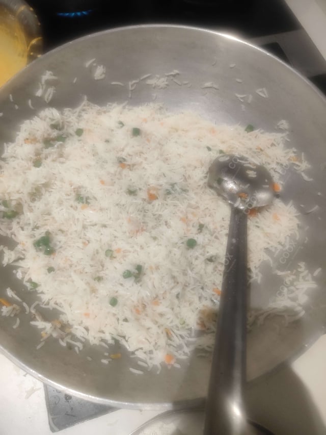 Delicious Veg Fried Rice prepared by COOX