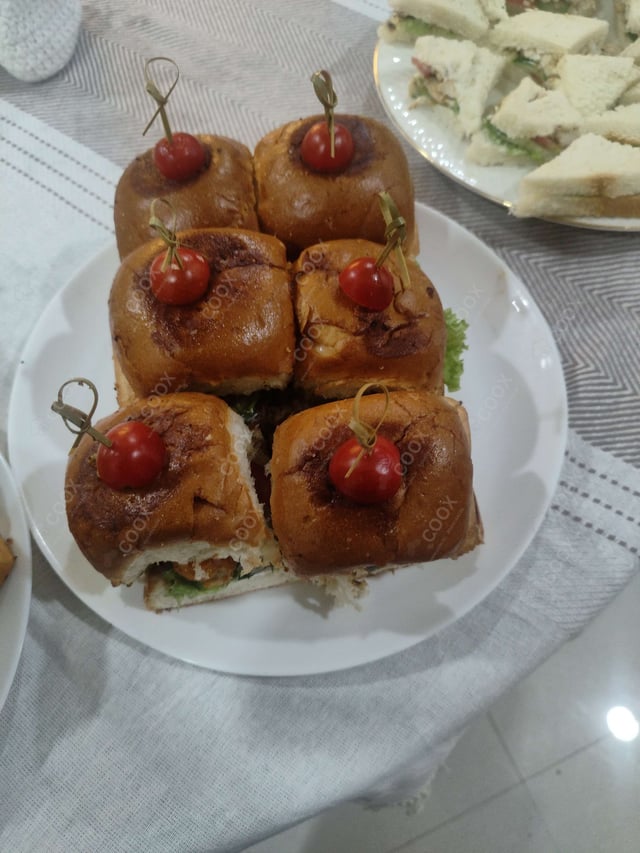 Delicious Mini Veg Burgers prepared by COOX