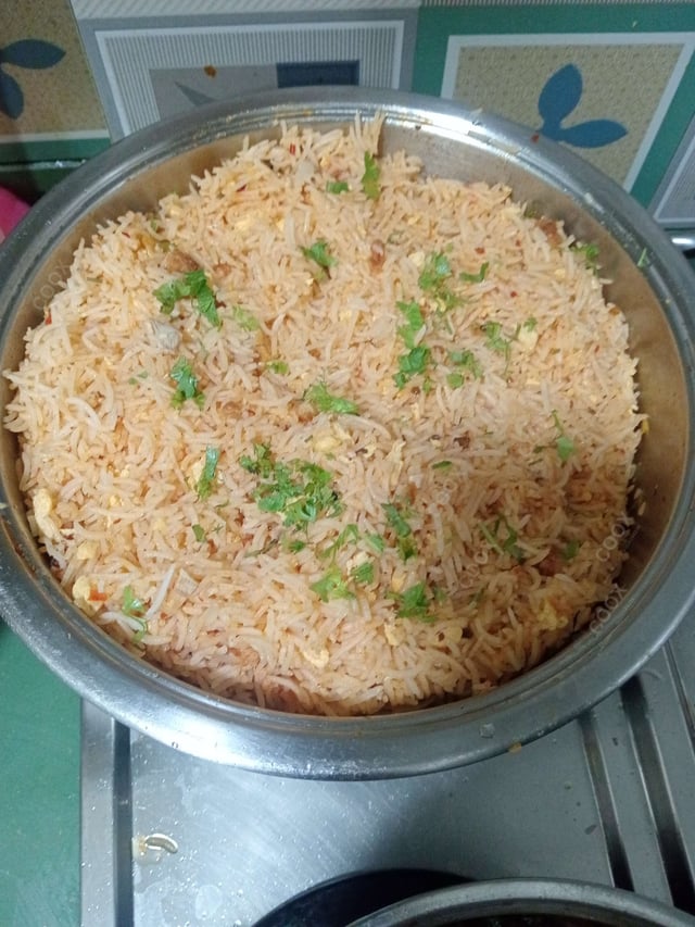 Delicious Schezwan Fried Rice prepared by COOX