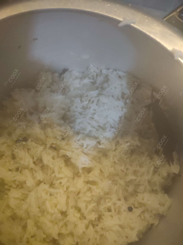 Delicious Jeera Rice prepared by COOX