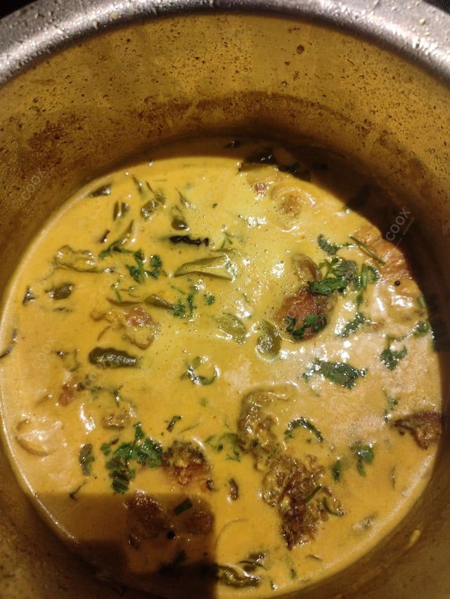 Delicious Kerala Fish Curry prepared by COOX