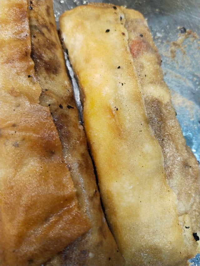 Delicious Veg Spring Rolls prepared by COOX