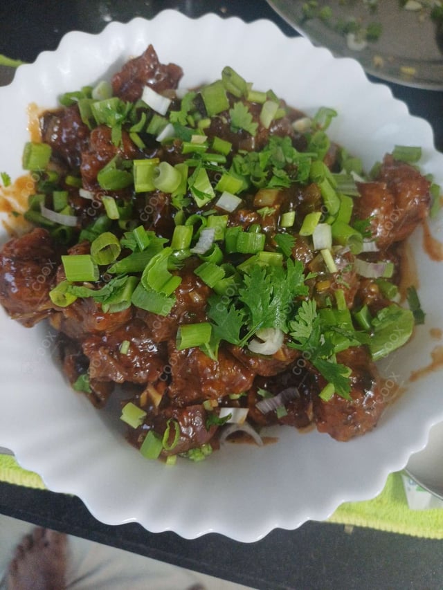 Delicious Veg Manchurian (Dry) prepared by COOX