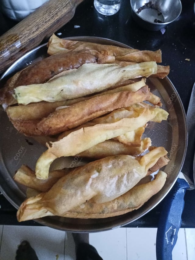 Delicious Veg Spring Rolls prepared by COOX