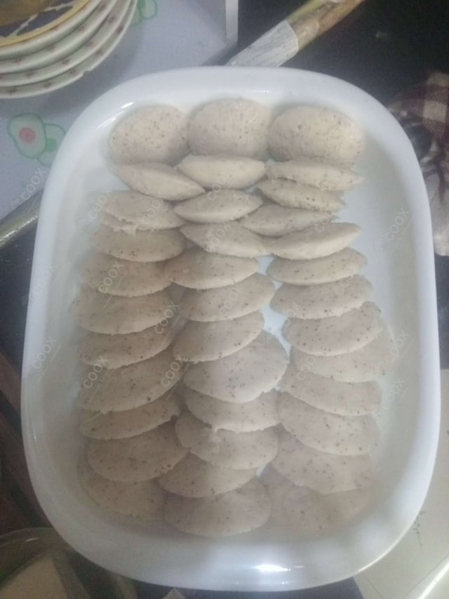 Delicious Plain Idli prepared by COOX