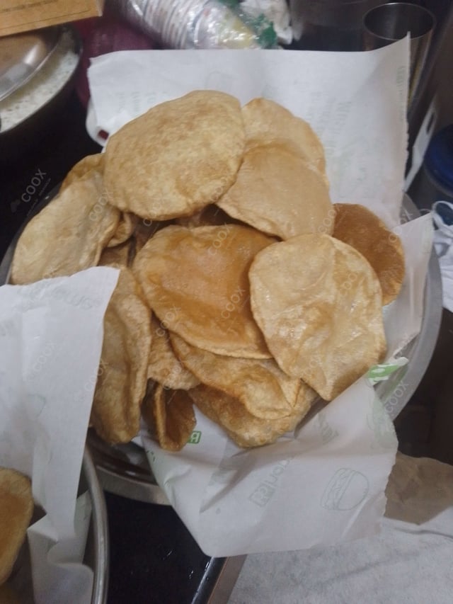 Delicious Pooris & Bedmis prepared by COOX