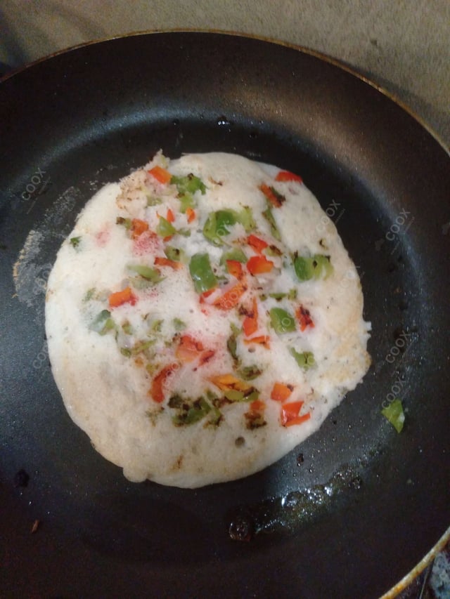 Delicious Mixed Veg Uttappam prepared by COOX
