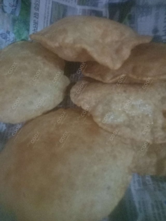 Delicious Pooris & Bedmis prepared by COOX