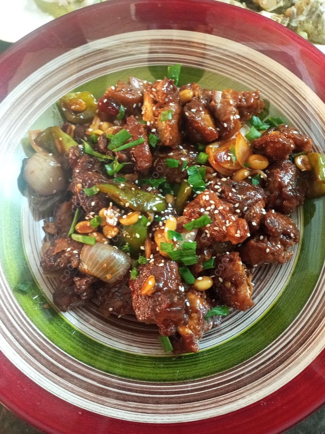 Delicious Kung Pao Chicken prepared by COOX
