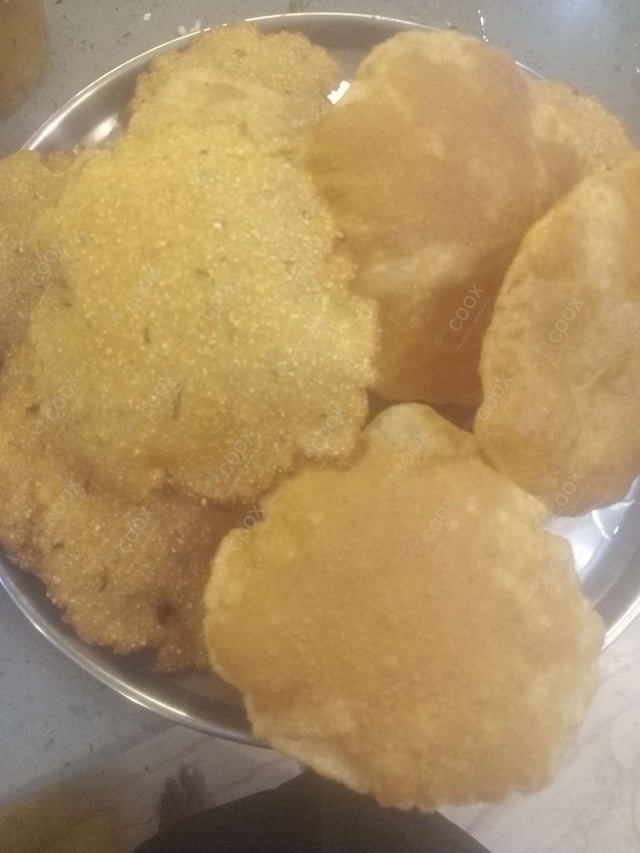 Delicious Pooris & Bedmis prepared by COOX