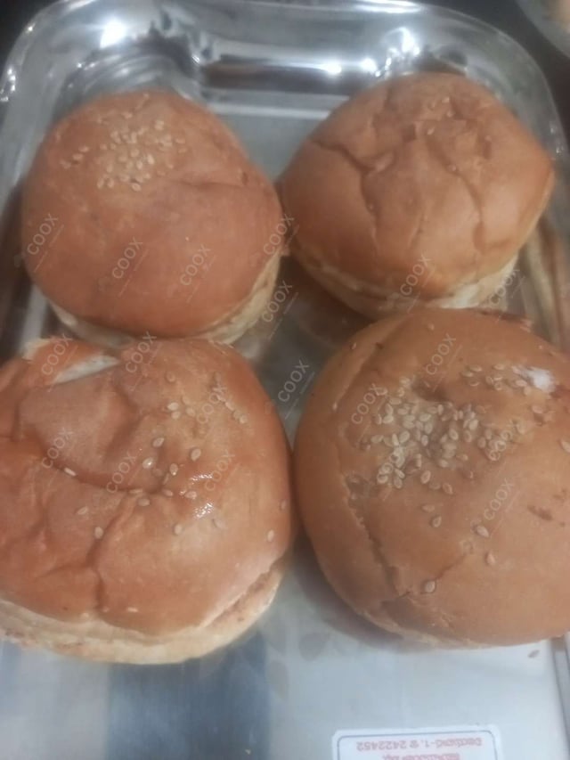 Delicious Mini Veg Burgers prepared by COOX