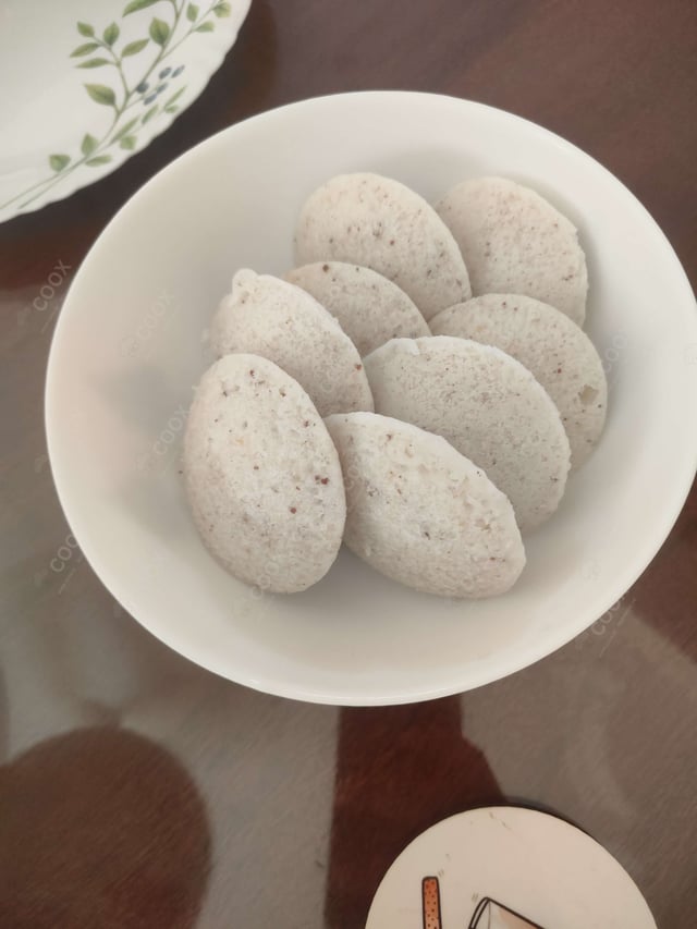 Delicious Idli Sambhar prepared by COOX