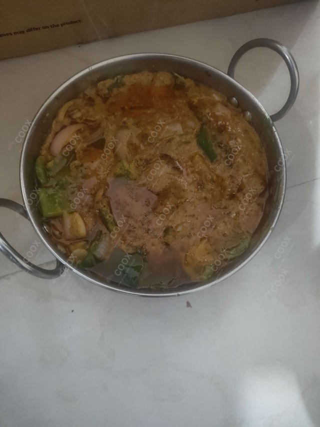 Delicious Kadhai Chicken prepared by COOX