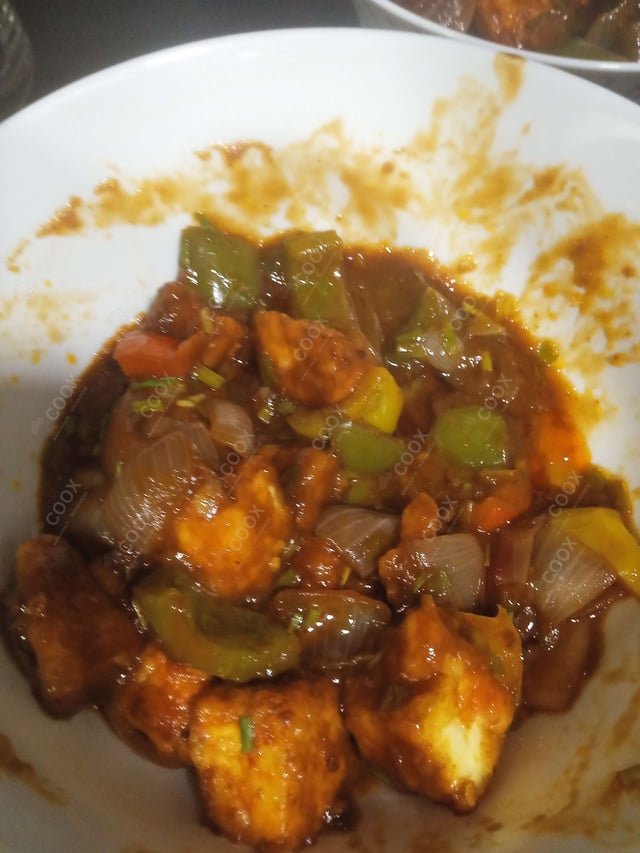 Delicious Chilli Paneer (Dry) prepared by COOX