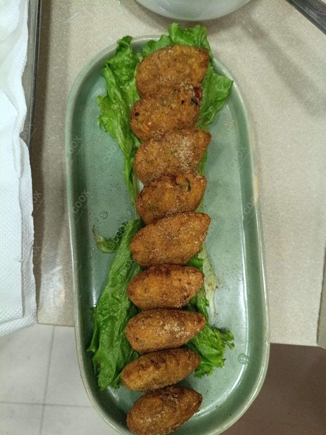 Delicious Veg Cutlets prepared by COOX
