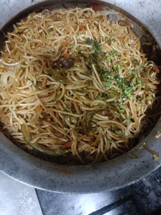 Delicious Veg Hakka Noodles prepared by COOX