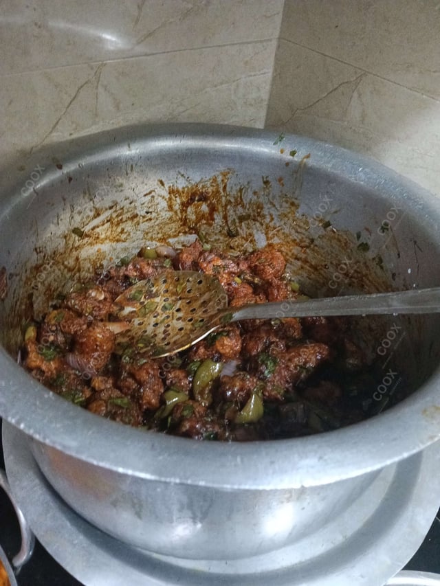 Delicious Veg Manchurian (Dry) prepared by COOX