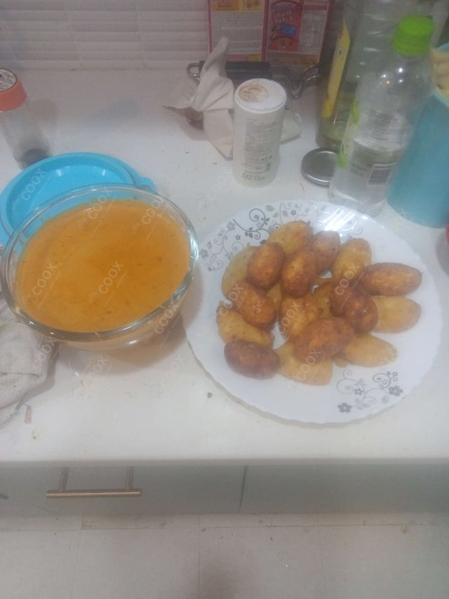 Delicious Malai Kofta (Orange Gravy) prepared by COOX