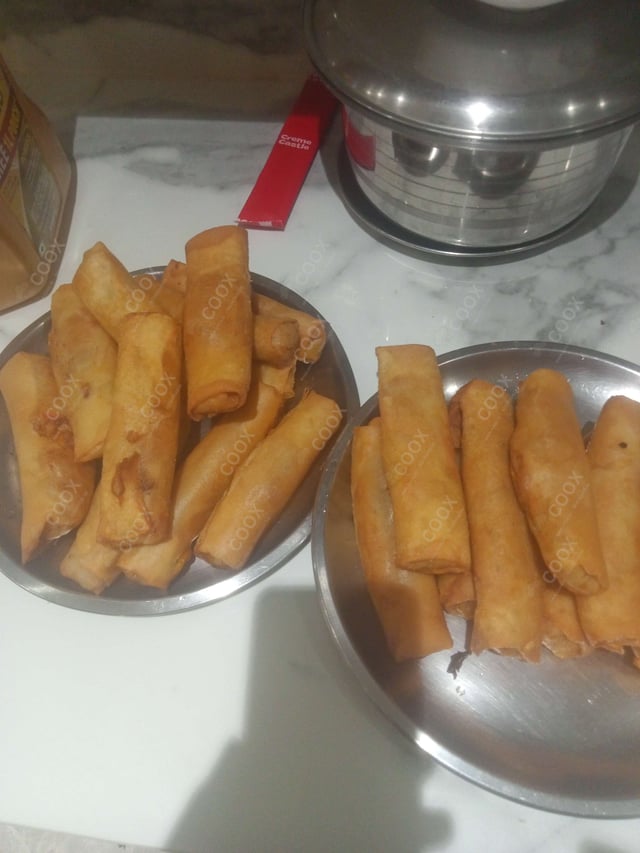 Delicious Veg Spring Rolls prepared by COOX