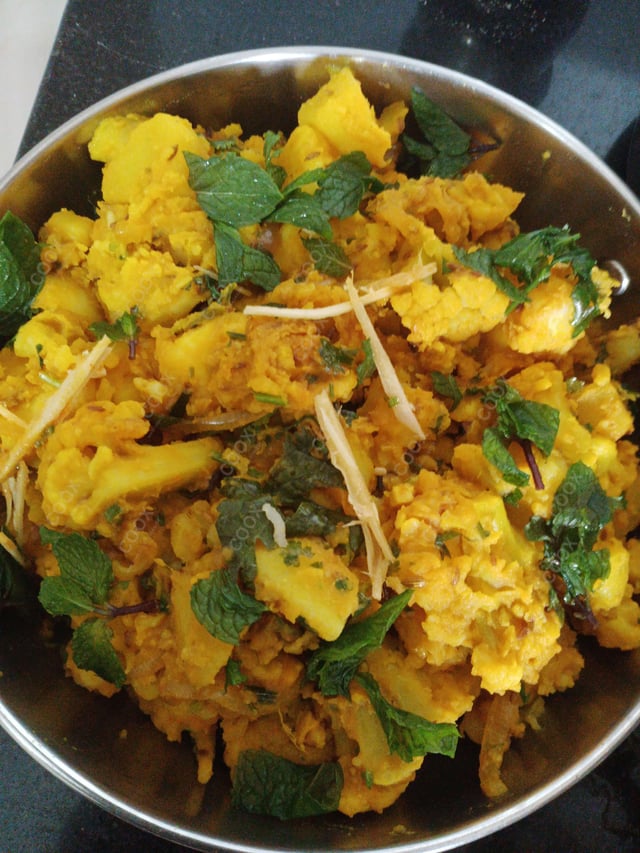 Delicious Dum Aloo prepared by COOX