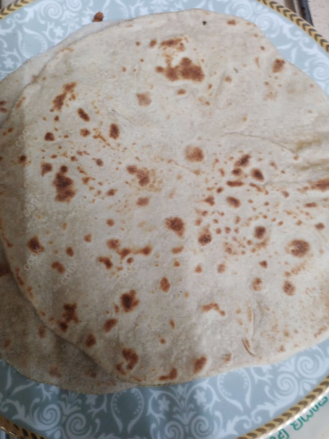 Delicious Tawa Rotis prepared by COOX