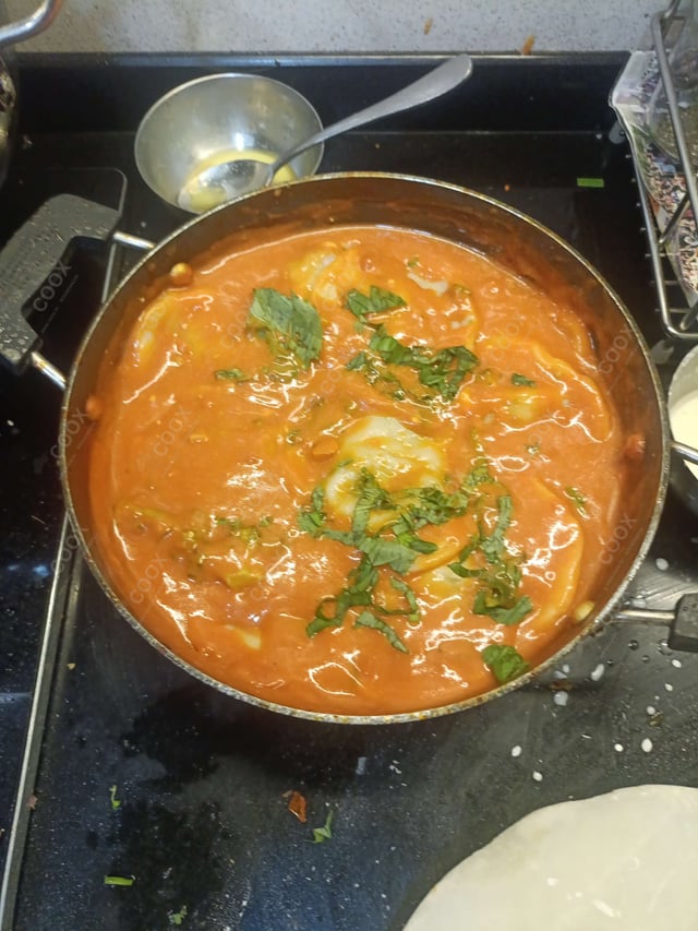 Delicious Ravioli in Pink Sauce prepared by COOX