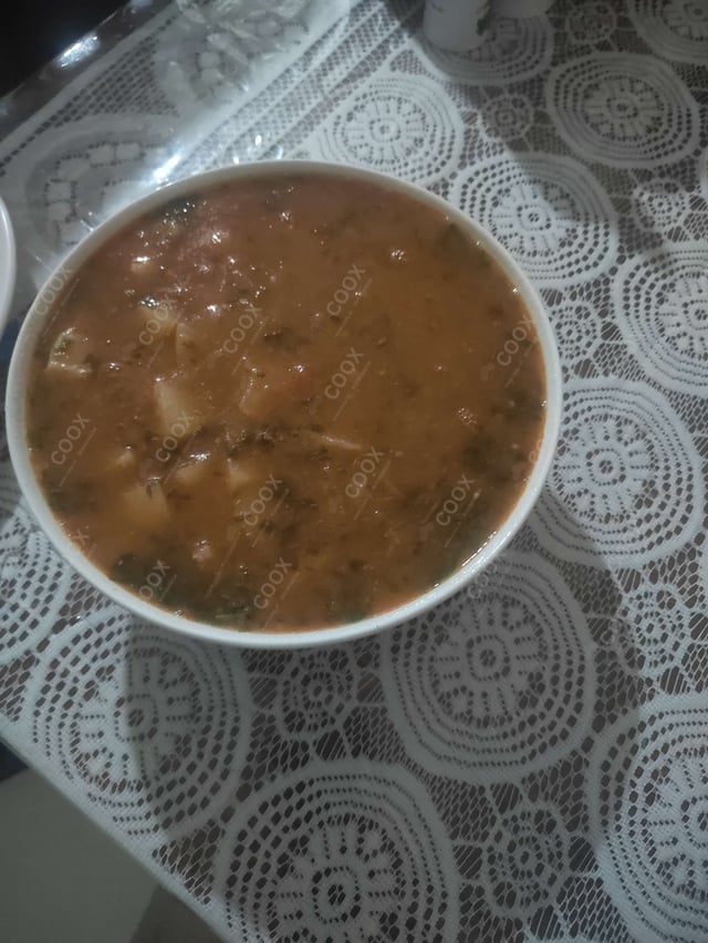 Delicious Aloo Rasedar prepared by COOX