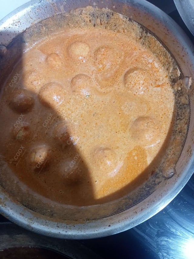 Delicious Malai Kofta (Orange Gravy) prepared by COOX
