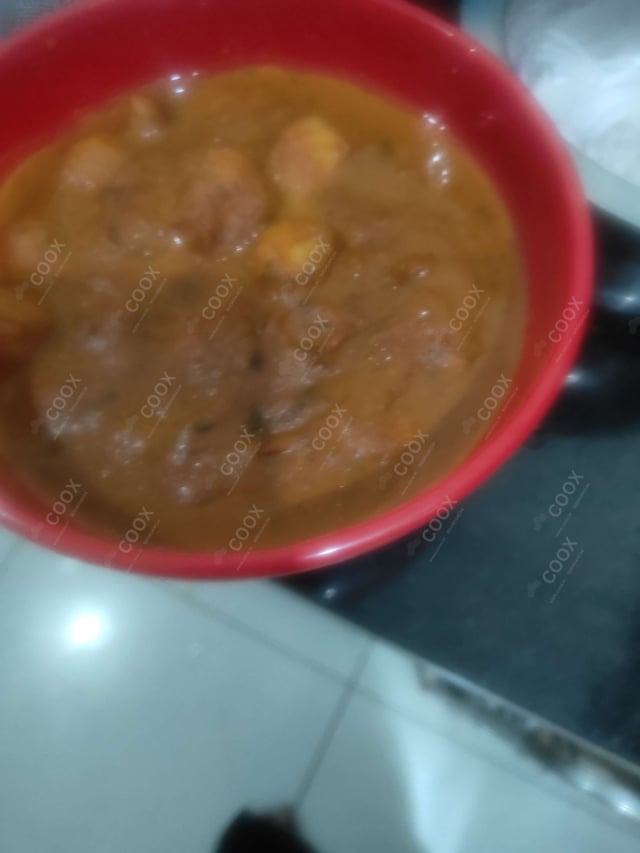 Delicious Dum Aloo prepared by COOX