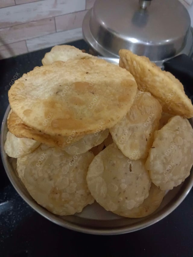 Delicious Pooris & Bedmis prepared by COOX