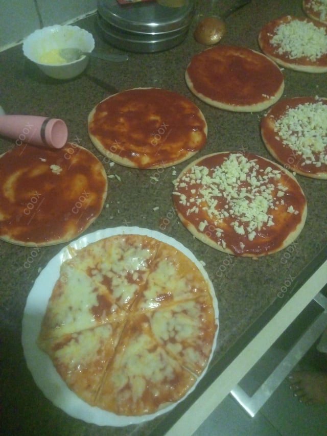 Delicious Margherita Pizza prepared by COOX
