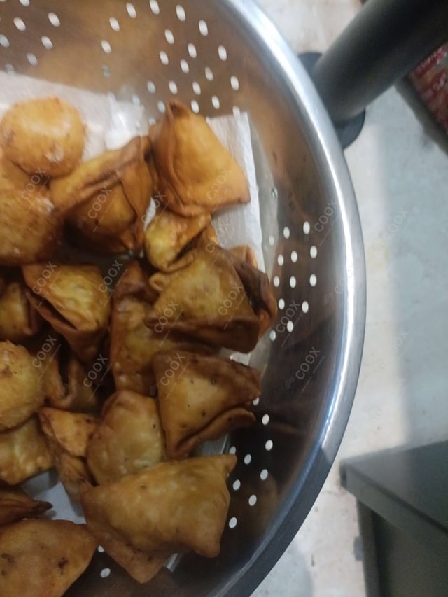 Delicious Mini Samosas prepared by COOX