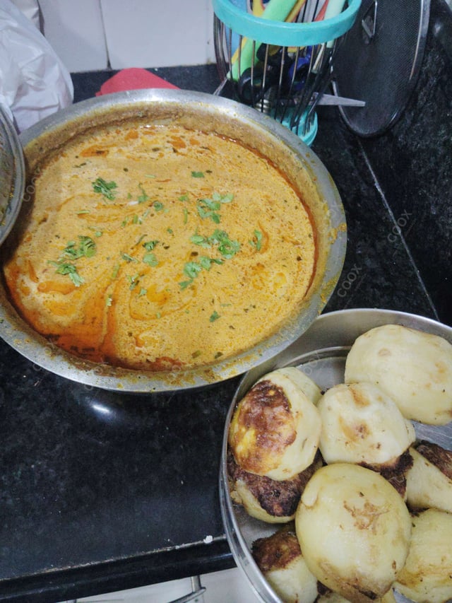 Delicious Stuffed Potatoes (Gravy) prepared by COOX
