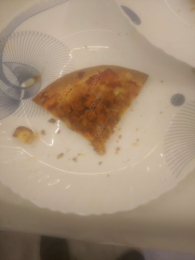 Delicious Veg Pizza prepared by COOX